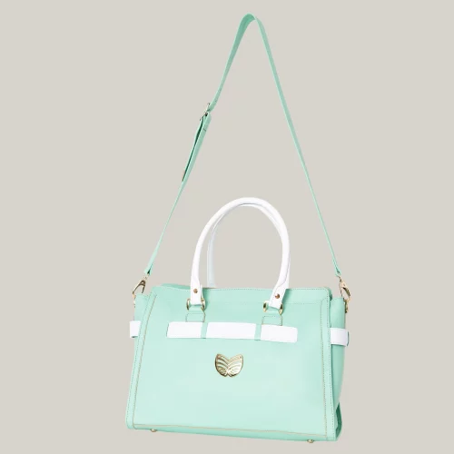 Sac caba en cuir Sophia couleur turquoise Orné d’un logo doré Lyetta Phalo.